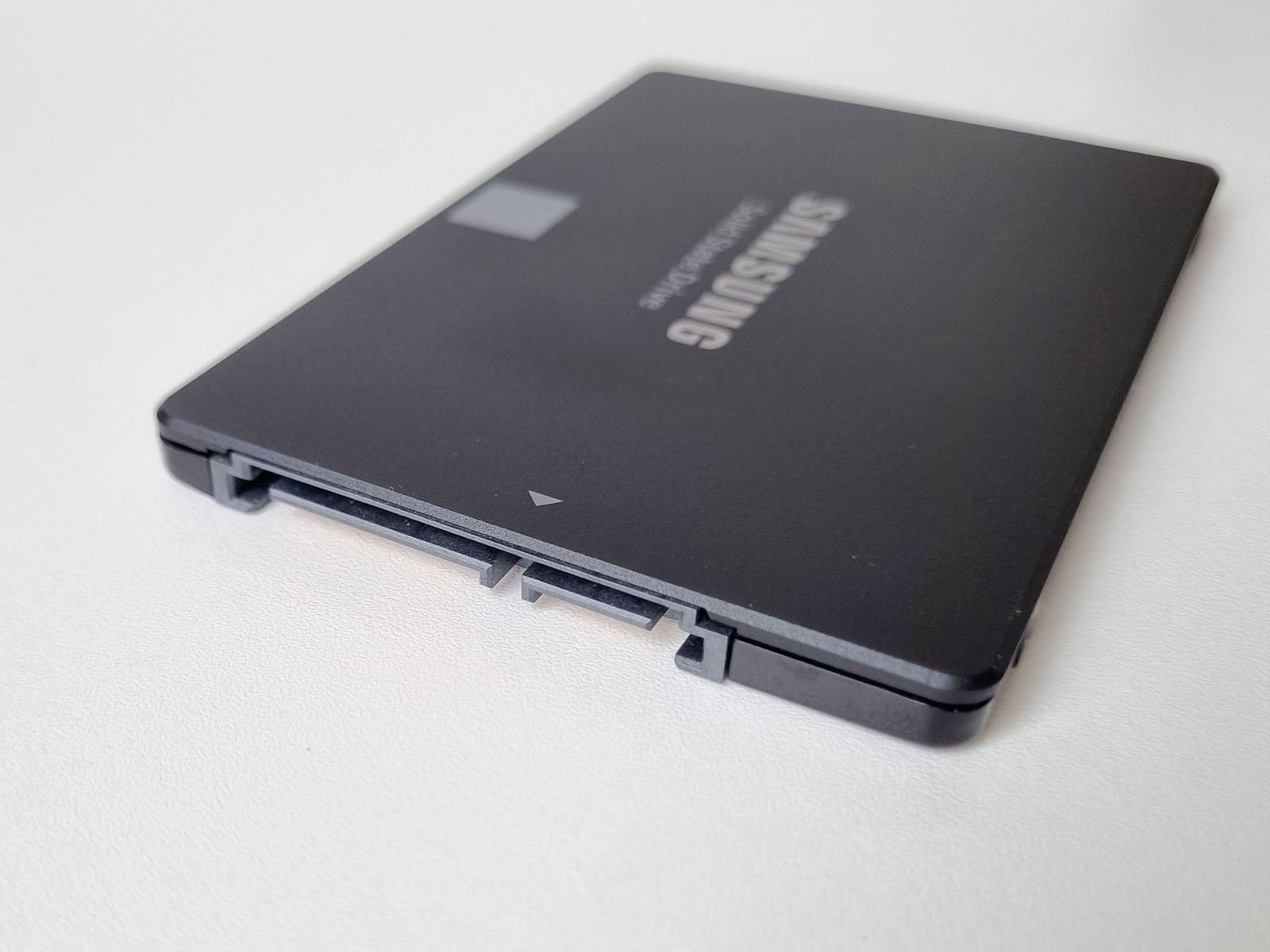 Angled view of a 2.5in SATA SSD, showing the combined SATA data and power connector edge.